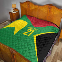 Green quilt with yellow and red sections, '21' custom name, and black corner