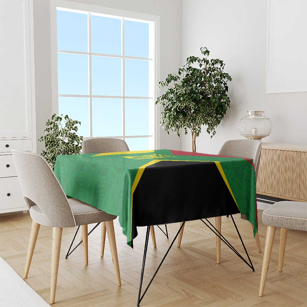 Green custom tablecloth with gold and black diagonal panel design on dining table