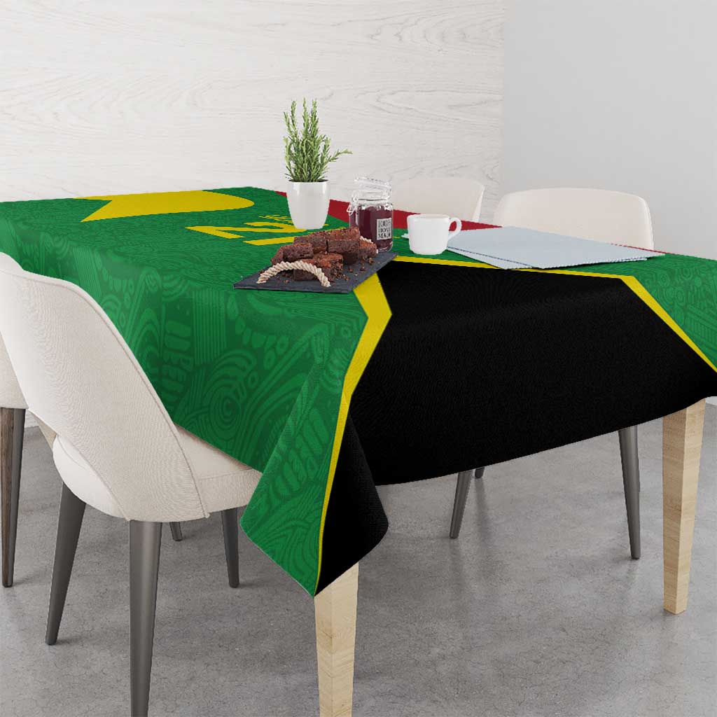 Green and black diagonal custom tablecloth draped over dining table with folded corner