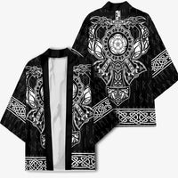 Black kimono shown front and back; white emblem, runes, and knot border details.