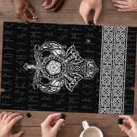 Black jigsaw puzzle with Viking emblem and patterned chains strip on the right