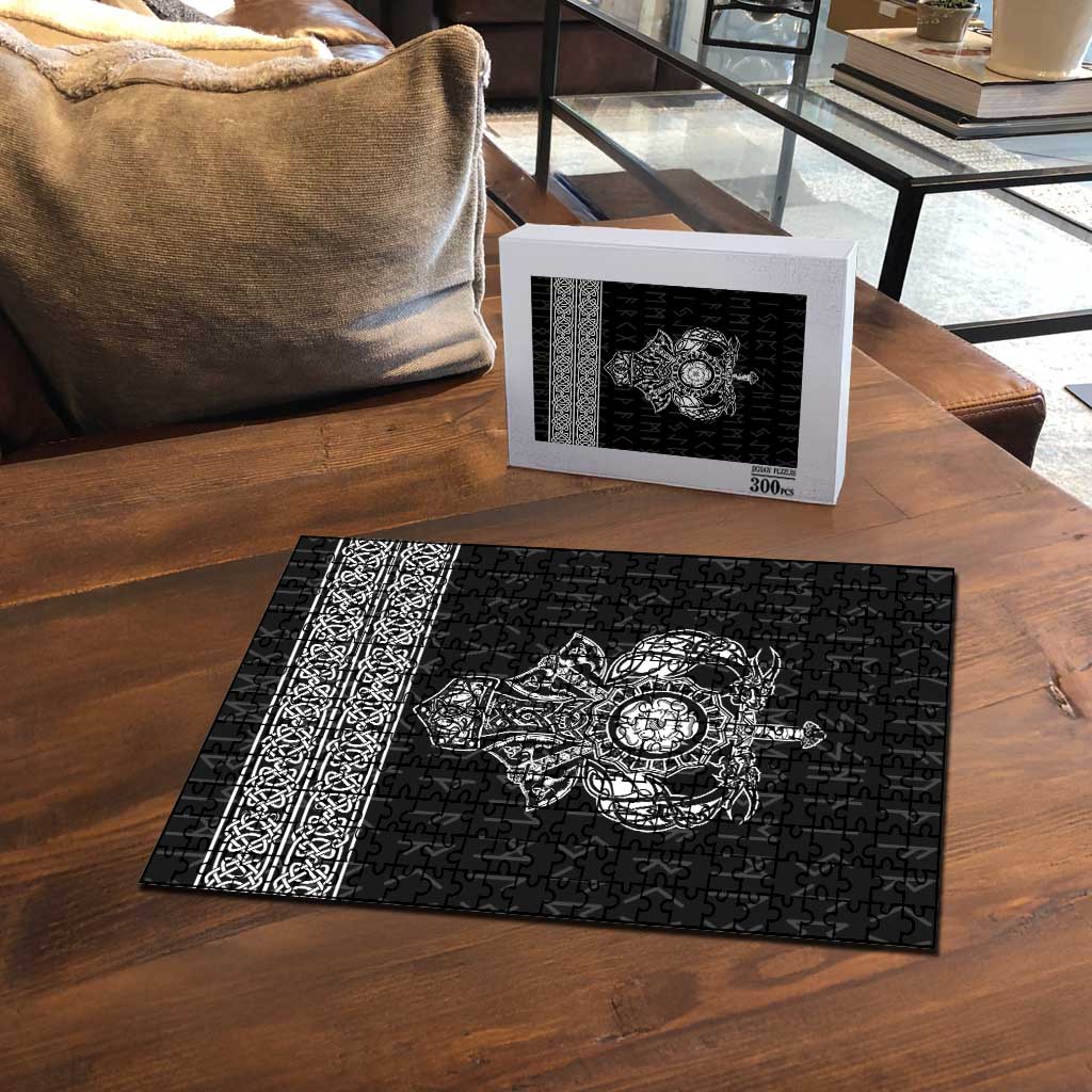 Black Spirit of Jorvik puzzle with Viking emblem, laid out with jigsaw pieces