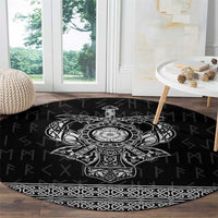 Black round rug with white Viking emblem center and braided border