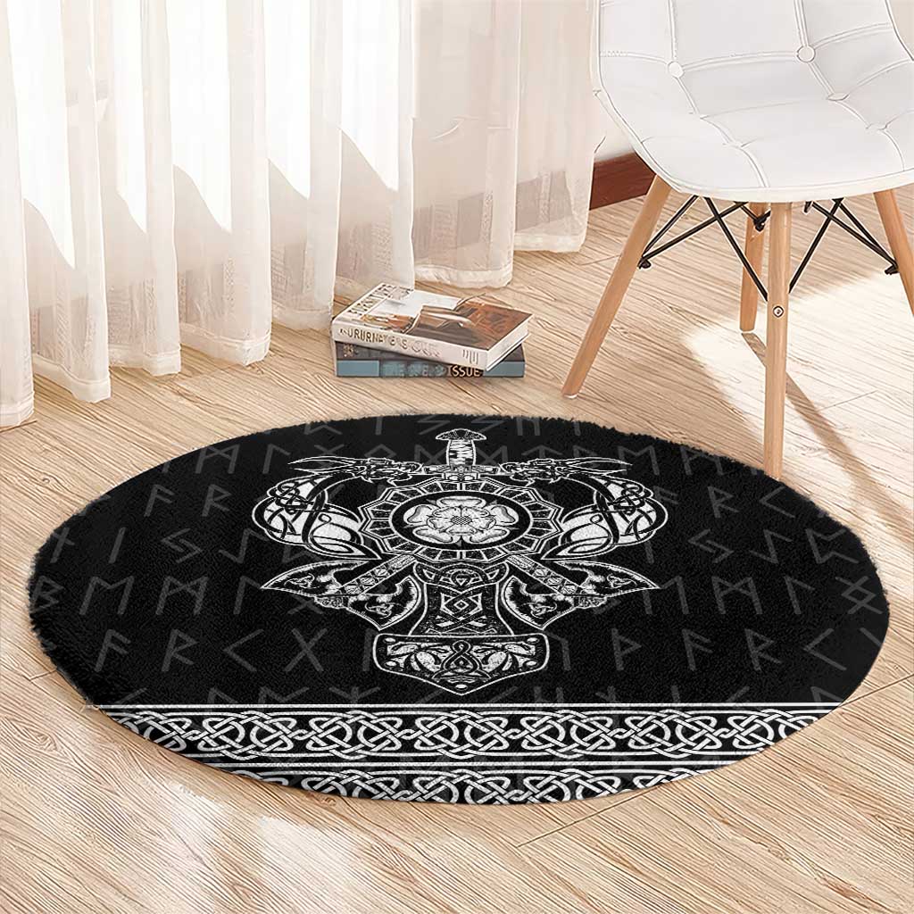 Black round Viking-style rug with central crest motif and patterned border