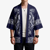 Unisex blue kimono with wide sleeves, open front, and white dragon panel prints
