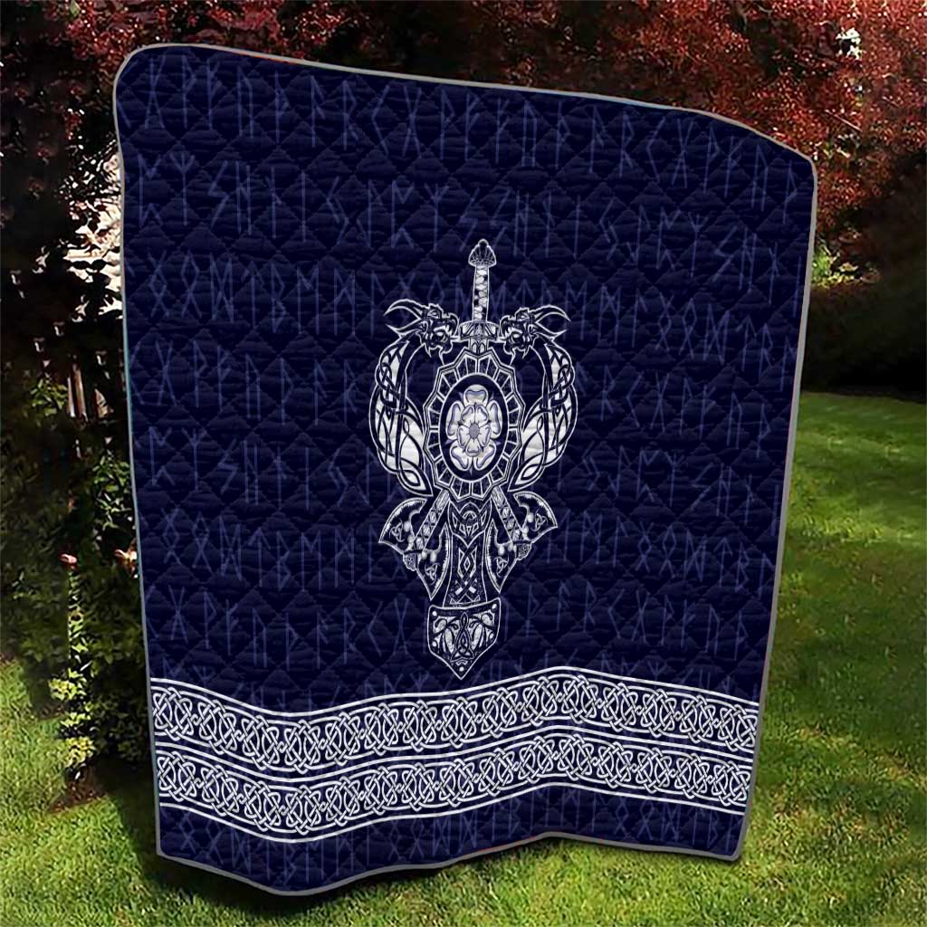 Navy-blue quilt with central white Viking axe emblem and white ornate border trim