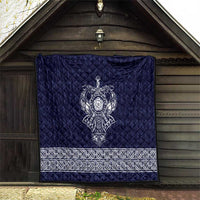 Blue quilted wall-hang quilt with central white Viking axe emblem and white border stripe