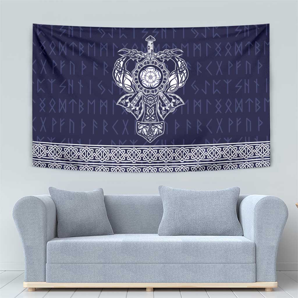 Blue tapestry with central Norse mask motif and repeating white border pattern