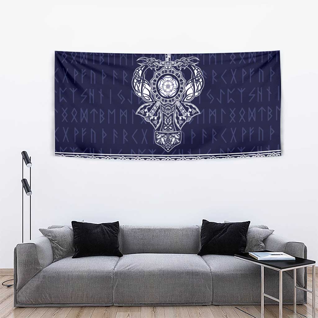 Blue tapestry with centered Norse emblem and decorative white woven-style border