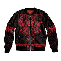 Black bomber jacket with red Celtic-style cross graphic and front zipper