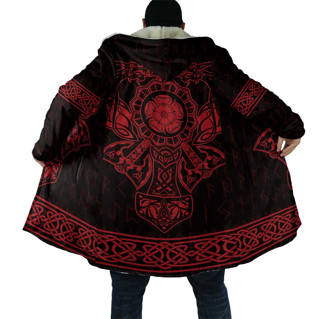 Back view of black hooded Viking cloak with large red emblem and patterned border