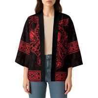 Unisex kimono on model, open front black with red rune borders, wide elbow-length sleeves