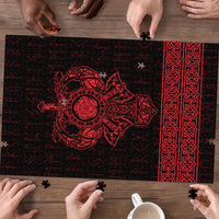 Red and black Viking rune jigsaw puzzle, central emblem and decorative red side panel.