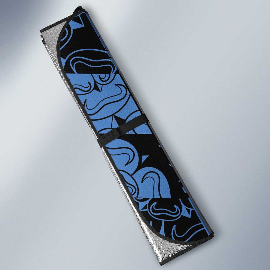 Auto sun shade edge close-up, blue and black fabric with '21' graphic