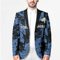 Unisex blazer in blue-and-black pattern with black trim, rose pin on chest pocket
