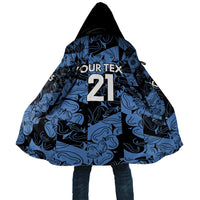 Hooded cape cloak with blue-and-black swirl pattern and large '21' graphic