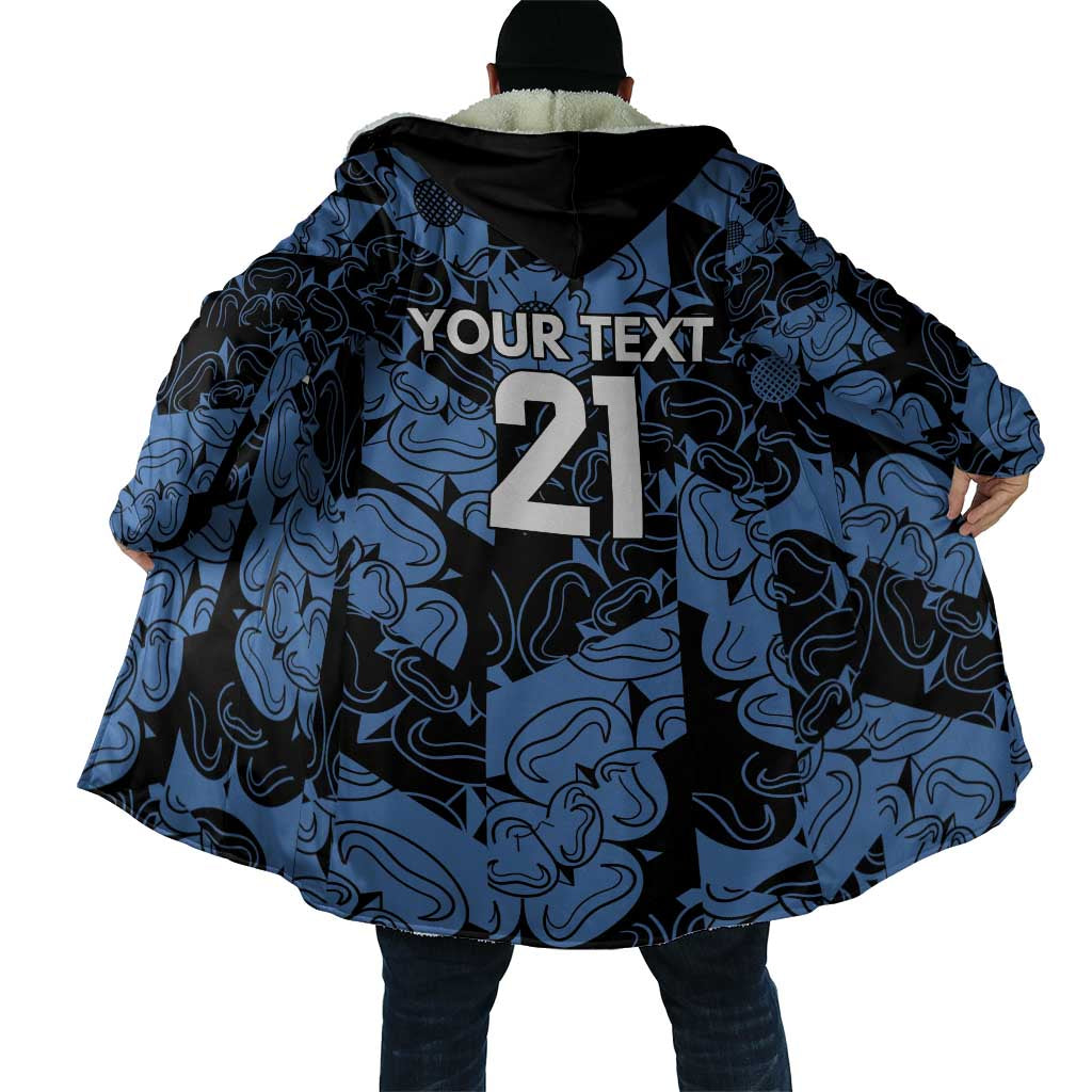 Back view hooded cape cloak with blue-and-black swirl pattern and large '21' design