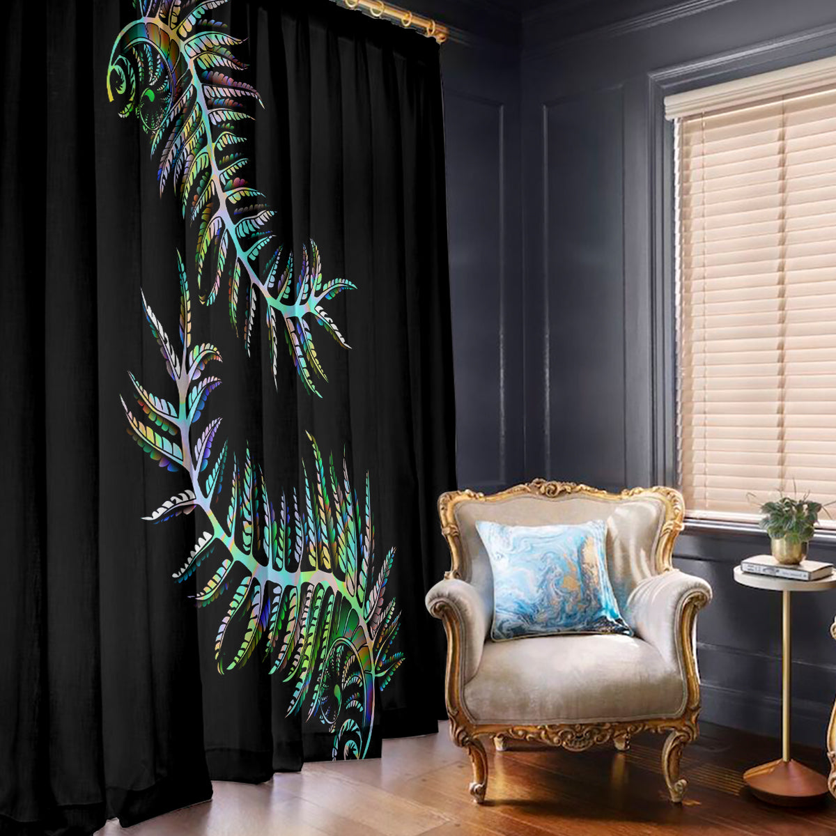 Black window curtain with green and blue native-style bird feather design panels.