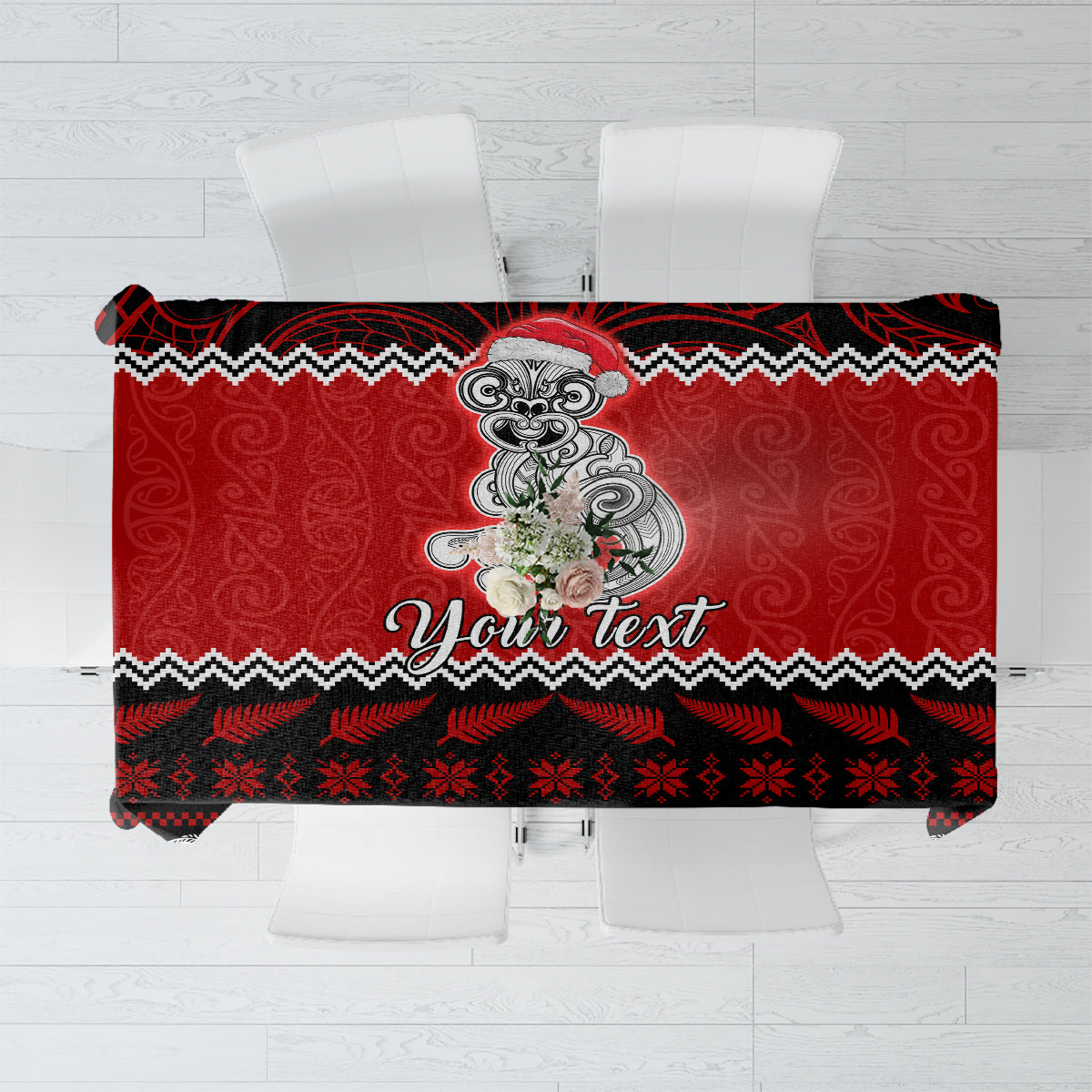 Red tablecloth with central tiki graphic, black zigzag border, and tribal motifs