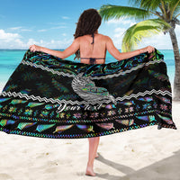 Black personalized sarong with large back graphic, zigzag trim, and 'Your text' near hem