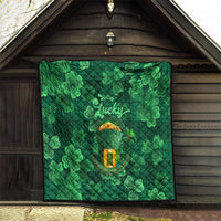 Green quilt with clover design, 'Feeling Lucky' text, and gold pot
