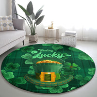 Round green St. Patrick's Day carpet featuring “Feeling Lucky” script with clover and gold pot art.