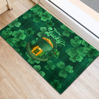 Green rubber doormat with 'Lucky' text and leprechaun hat graphic