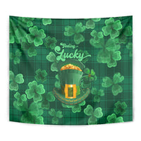 Green clover tapestry wall hanging with “Lucky” text and leprechaun pot