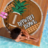Round brown beach blanket with white fringe, green palm design and Hawaii text