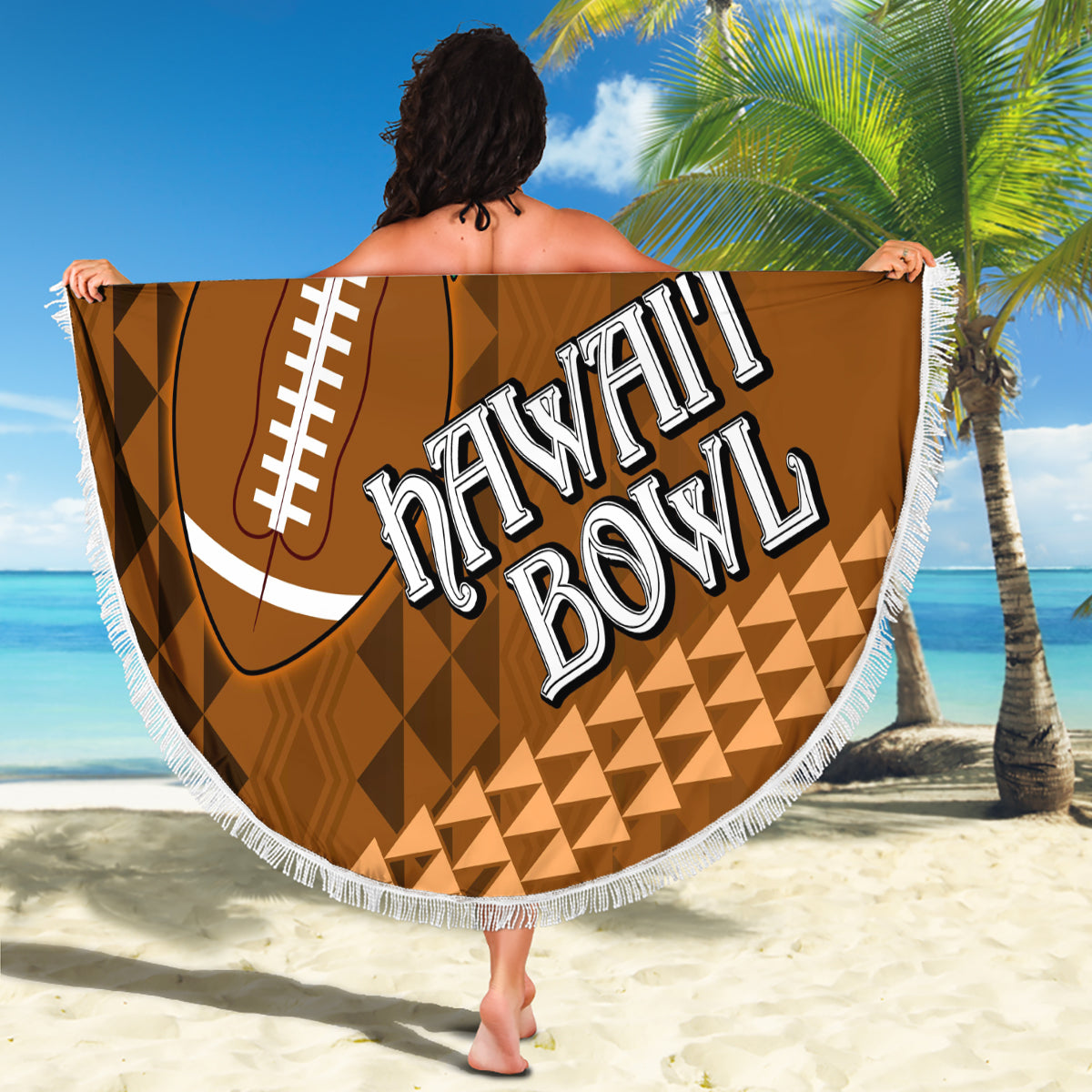 Round brown beach blanket with white fringe, green tropical art and bold Hawaii text