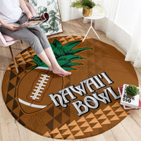Round brown rug with green palm tree, football logo, Hawaii lettering, and tan triangle pattern
