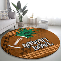Round brown rug with green palm, football logo, Hawaii lettering, and tan geometric diamond pattern