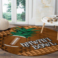 Round brown rug with green palm, football emblem, Hawaii text, and tan diamond tribal pattern
