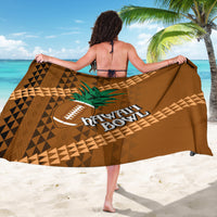 Brown tribal-pattern sarong with football graphic and Hawaii Bowl text, worn