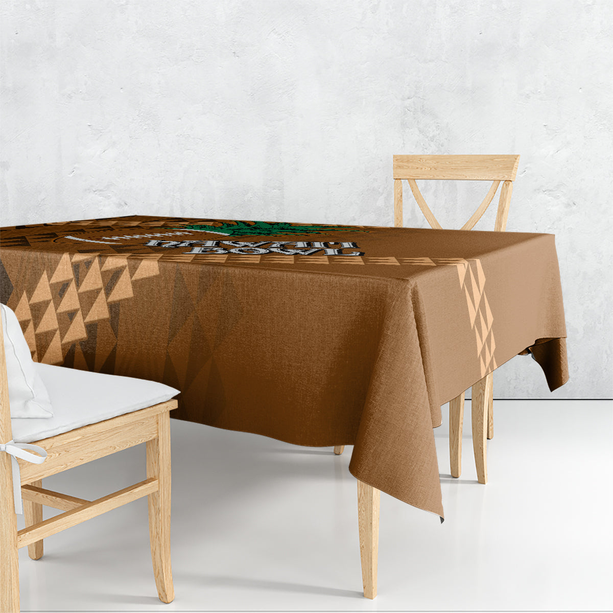 Brown bowl tablecloth with tan geometric diamond tribal pattern on a dining table