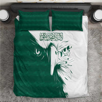 Green and white duvet cover set with falcon face print and two matching green pillows