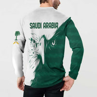 Green and white sweatshirt, back view, “SAUDI ARABIA” text with falcon print