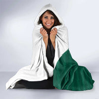 Green and white hooded blanket with hood and falcon face print, draped wrap