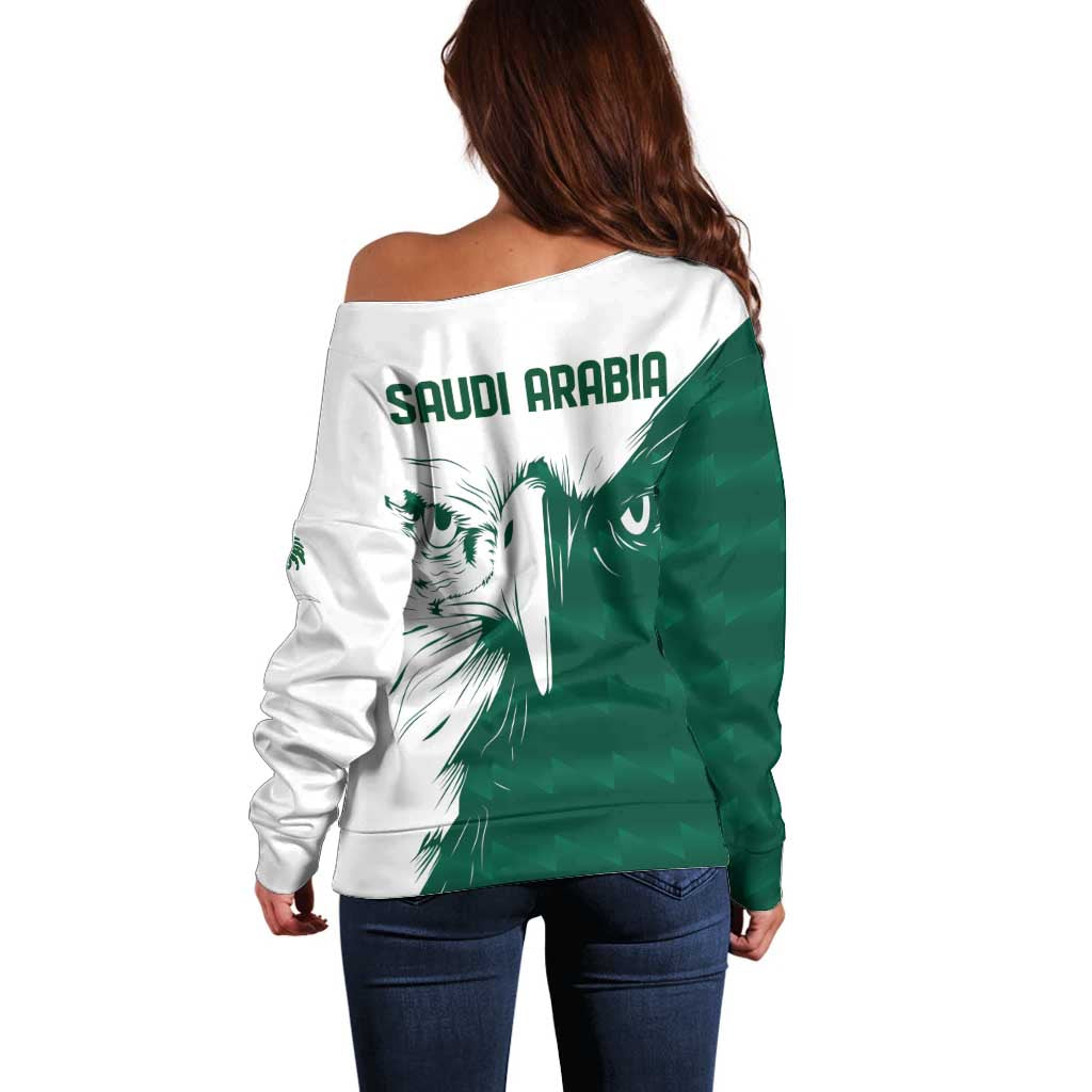 Women’s off-shoulder sweater, back view with 'SAUDI ARABIA' text and falcon print