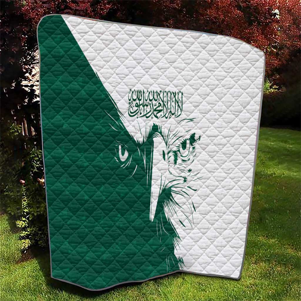 Green and white quilt with diamond quilting and falcon face motif in the center