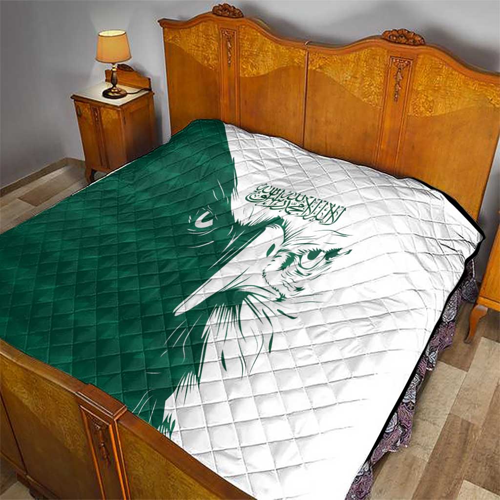 Green and white falcon quilt shown on a bed with diamond quilted texture