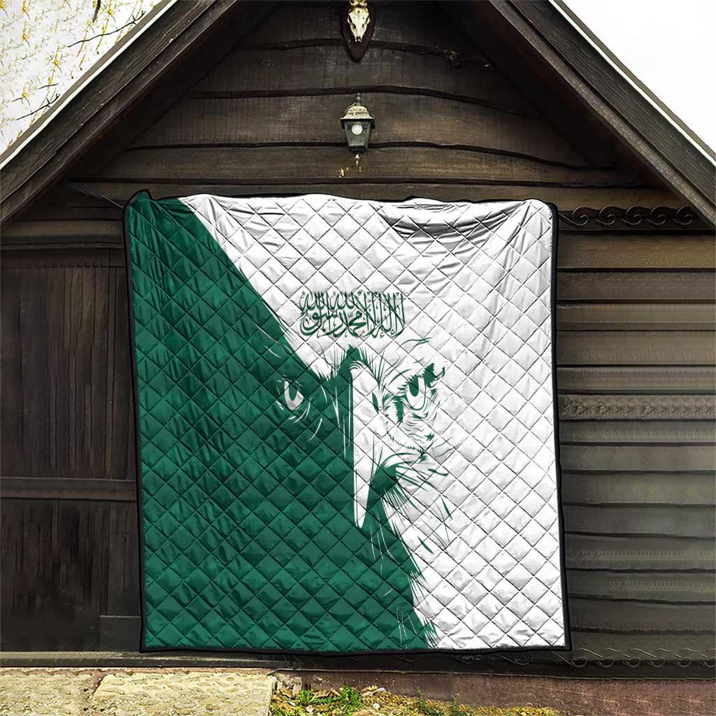 Green and white diamond-stitched quilt with falcon graphic and decorative script