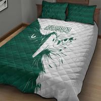 Green and white falcon quilt bed set featuring a large falcon print and Arabic script