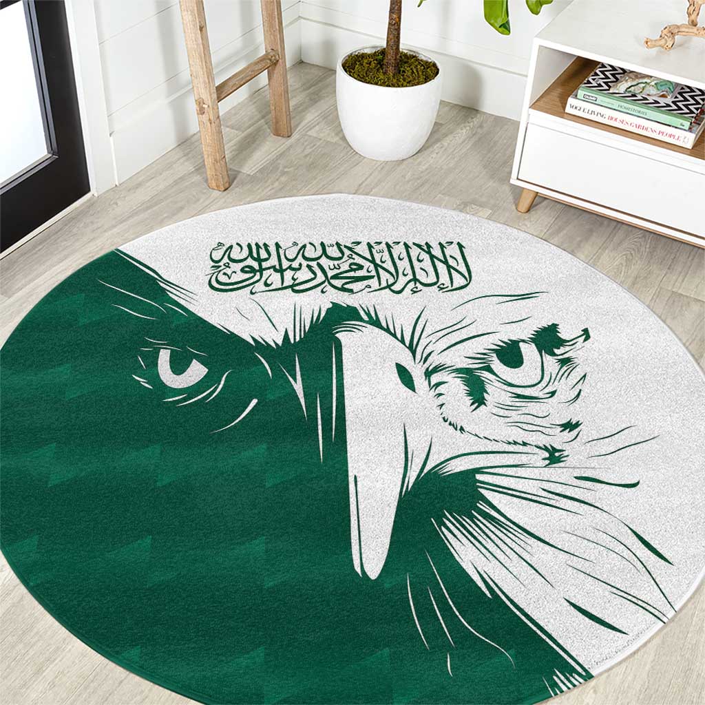 Green round carpet with white falcon graphic and Arabic calligraphy center