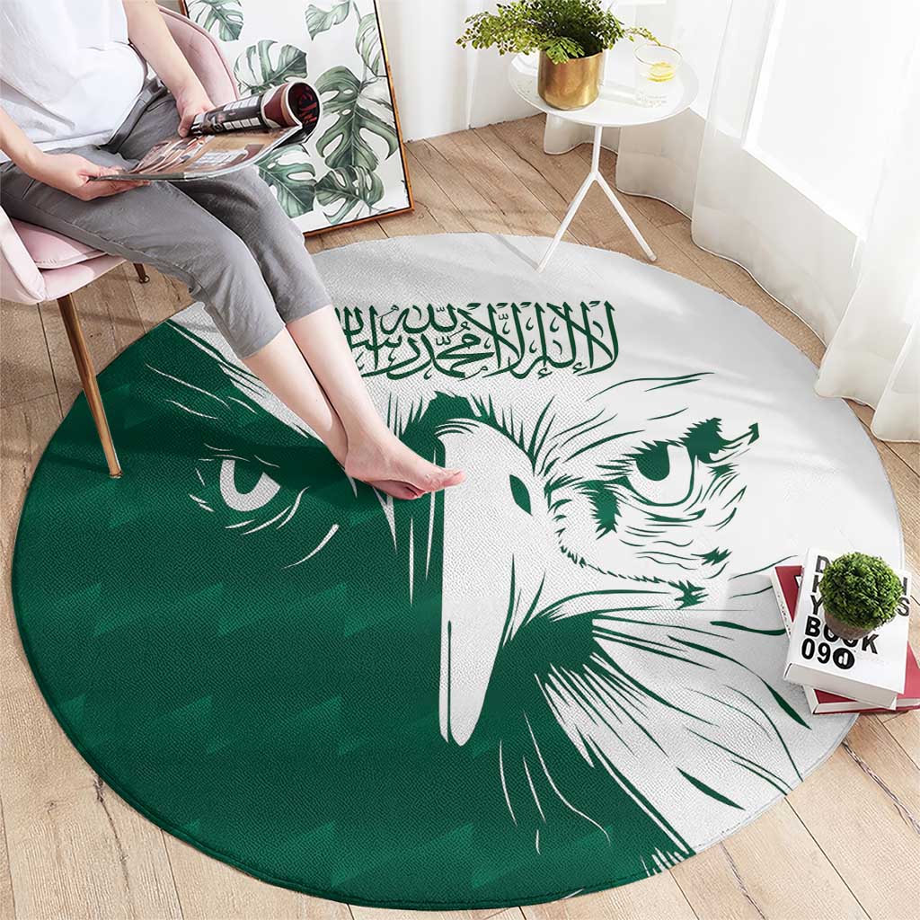 Green round carpet with large white falcon face and Arabic calligraphy