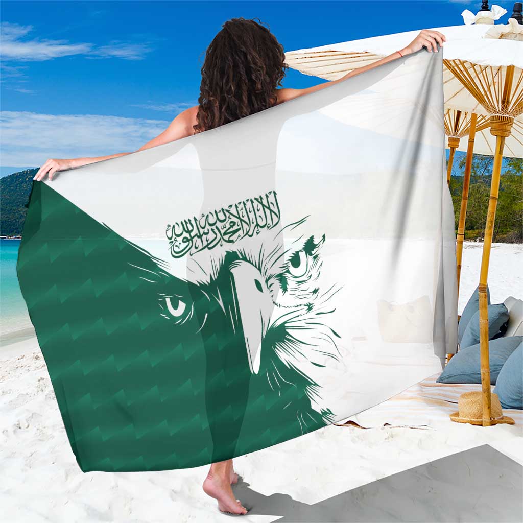 Green and white falcon sarong with Arabic calligraphy and large bird face print