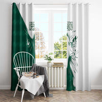 Green and white grommet-top curtain panels with falcon artwork and Arabic motifs