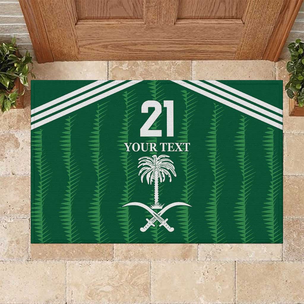 Green rubber doormat with white '21', palm tree and sword graphic