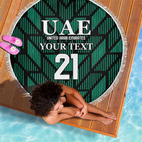 Green round beach blanket with UAE logo and Your Text over 21, fringed border
