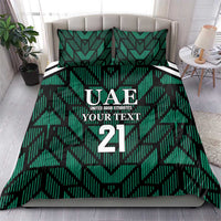Green UAE football bedding set featuring UAE 21 crest, geometric stripes, and matching pillowcases